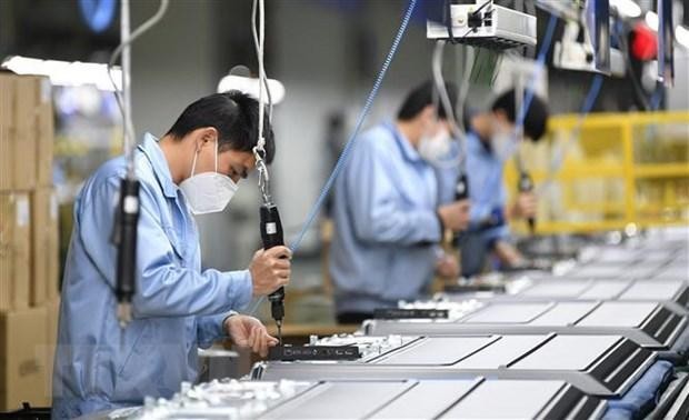 Công nhân sản xuất tại một phân xưởng ở Quảng Châu, thủ phủ tỉnh Quảng Đông, Trung Quốc. (Nguồn: THX/TTXVN)