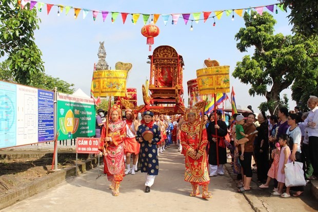 Nghi lễ rước kiệu tại lễ hội. Ảnh: Nguyễn Thắng/TTXVN.