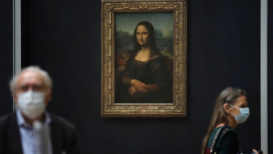 Kiệt tác "Mona Lisa" được trưng bày tại Bảo tàng Louvre, Pháp. Ảnh: AP.