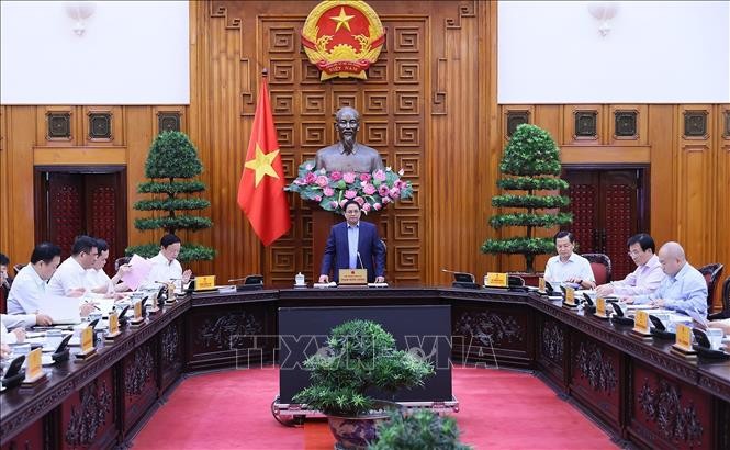 Thủ tướng Phạm Minh Chính chủ trì cuộc họp về tình hình cung ứng điện cho sản xuất, kinh doanh và tiêu dùng. Ảnh: Dương Giang/TTXVN.
