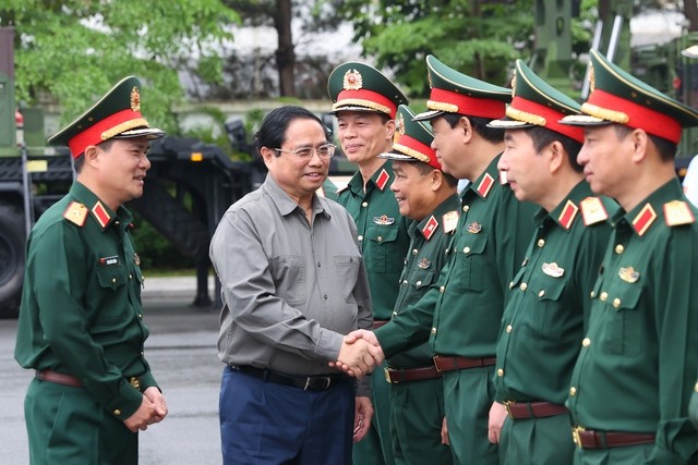 Thủ tướng Phạm Minh Chính làm việc với Tập đoàn Công nghiệp - Viễn thông Quân đội (Viettel) - Ảnh: VGP/Nhật Bắc.