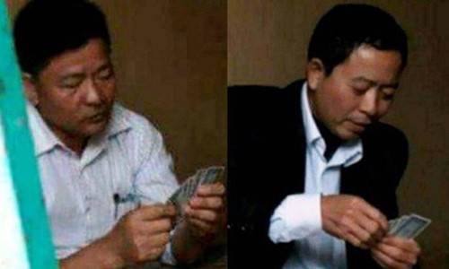 Hình ảnh ông Vũ Trọng Hải - Bí thư Đảng ủy, Chủ tịch HĐND (phải) và ông Trần Văn Phiệt - Phó Chủ tịch UBND xã Minh Châu đang đánh bạc.
