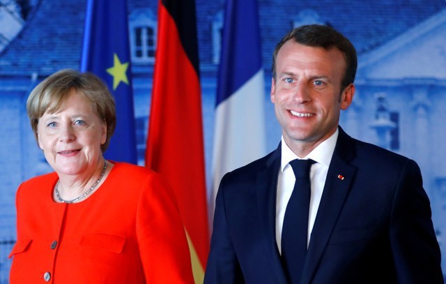 Thủ tướng Đức Merkel và Tổng thống Pháp Macron. Ảnh: Newsbook