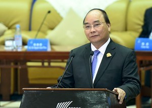 Thủ tướng Nguyễn Xuân Phúc đối thoại với lãnh đạo các DN hàng đầu Trung Quốc. Ảnh: VGP/Quang Hiếu
