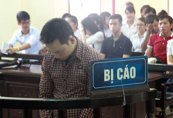 Bị cáo Quang tại phiên tòa xét xử. Ảnh: H.A. 