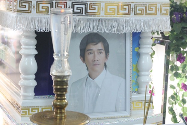 Di ảnh Minh Thuận tại tang lễ. Ảnh: M.N.