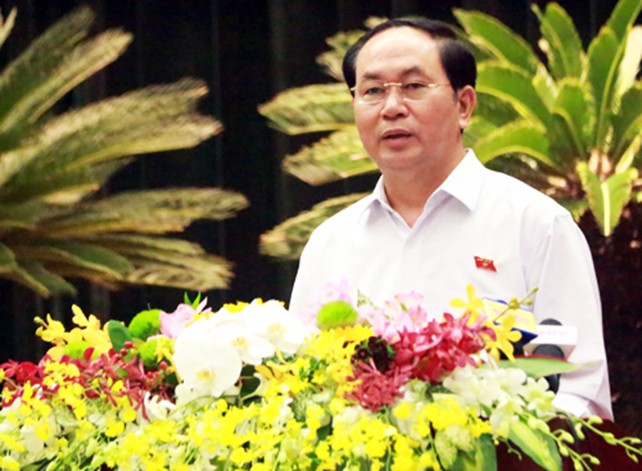 Chủ tịch nước Trần Đại Quang nói chuyện với các doanh nhân TP HCM. Ảnh: Trung Sơn