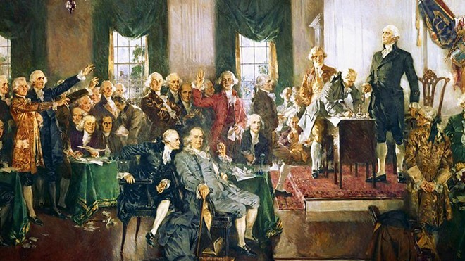 Bức tranh nổi tiếng của họa sĩ Howard Chandler Christy mô tả lại Hội nghị Lập hiến của Mỹ năm 1787. Tại hội nghị này, các nhà lập pháp đã thông qua quy chế bầu cử đại cử tri. Ảnh: Us.tomonews.com