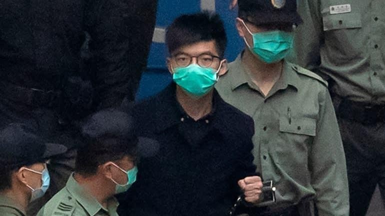 Joshua Wong đang thi hành án tù 13,5 tháng vì vai trò trong các cuộc biểu tình trên đường phố vào năm 2019, ảnh chụp tháng 3/2021 (Ảnh: AP)
