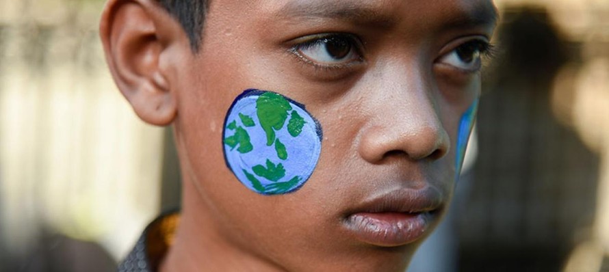 "Cuộc chiến chống biến đổi khí hậu bắt đầu ở trường học." (Ảnh: UNESCO)