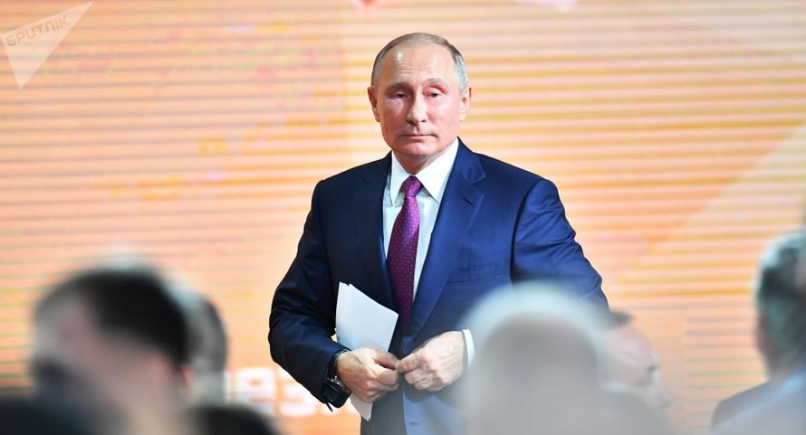Tổng thống Nga Vladimir Putin trong buổi họp báo thường niên. Ảnh: Sputnik