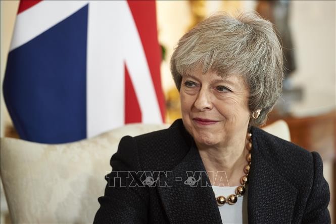  Thủ tướng Anh Theresa May kêu gọi Công đảng gạt bỏ bất đồng, cùng thỏa hiệp về việc Anh rời khỏi EU. Ảnh: AFP/TTXVN