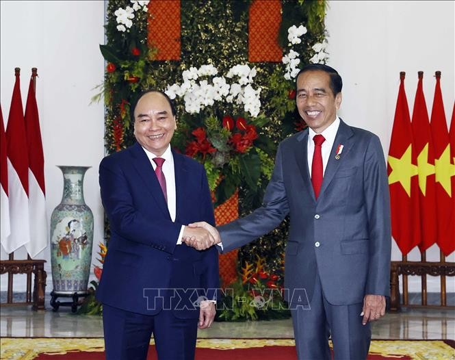 Chủ tịch nước Nguyễn Xuân Phúc chụp ảnh chung với Tổng thống Indonesia Joko Widodo trước khi tiến hành hội đàm. Ảnh: Thống Nhất/TTXVN