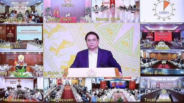Thủ tướng Phạm Minh Chính chủ trì hội nghị trực tuyến đẩy mạnh giải ngân vốn đầu tư công năm 2023. (Ảnh: Dương Giang/TTXVN)
