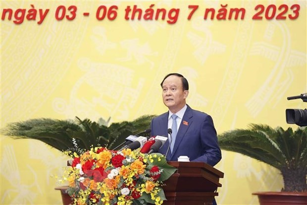 Chủ tịch Hội đồng Nhân dân thành phố Hà Nội Nguyễn Ngọc Tuấn phát biểu khai mạc kỳ họp. (Ảnh: Doãn Tấn/TTXVN)